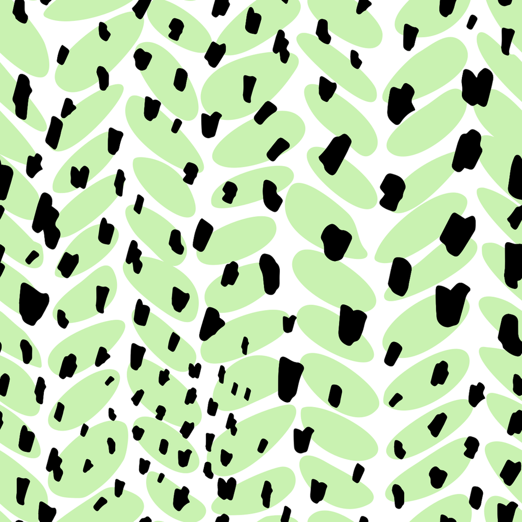 Cactus print close-up: black flecks on soft green ovals on white