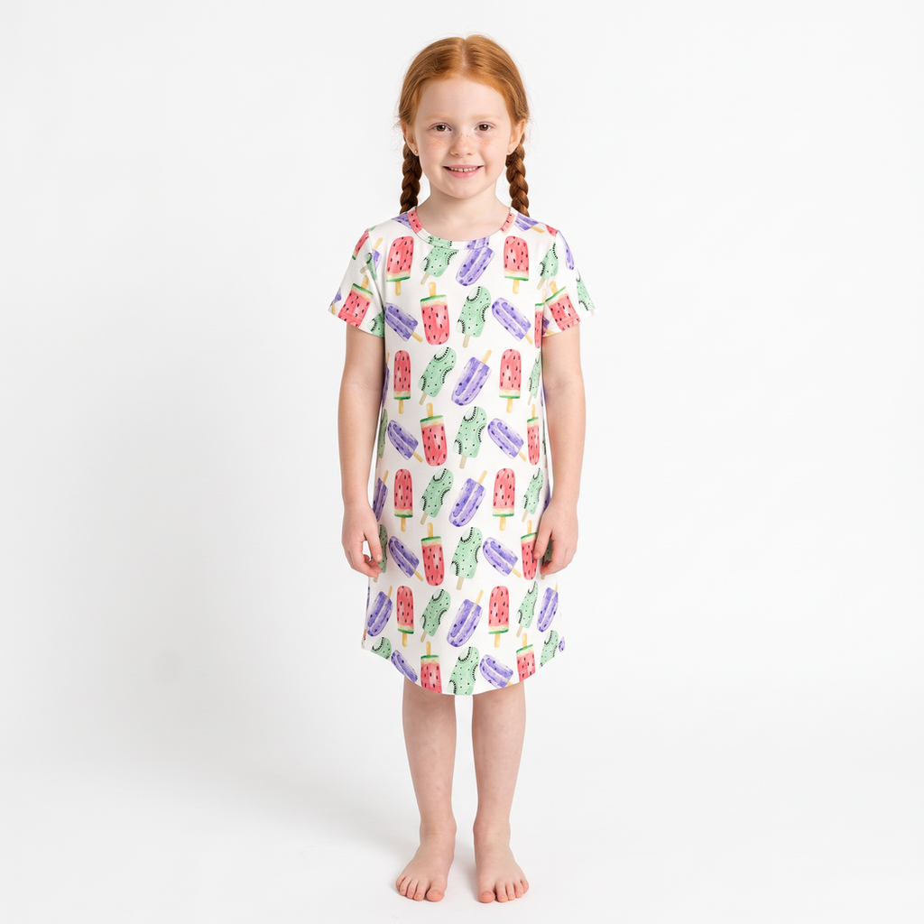 Girl wearing Popsicle Kids Snuggle Dress in watercolour popsicle print, front view