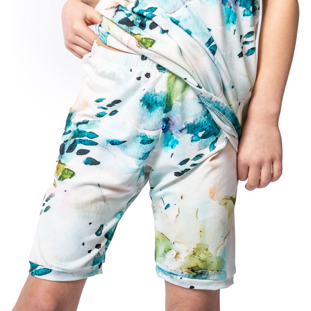 Close-up detail of child wearing Aurora Bamboo Shorties PJ Set in blue
