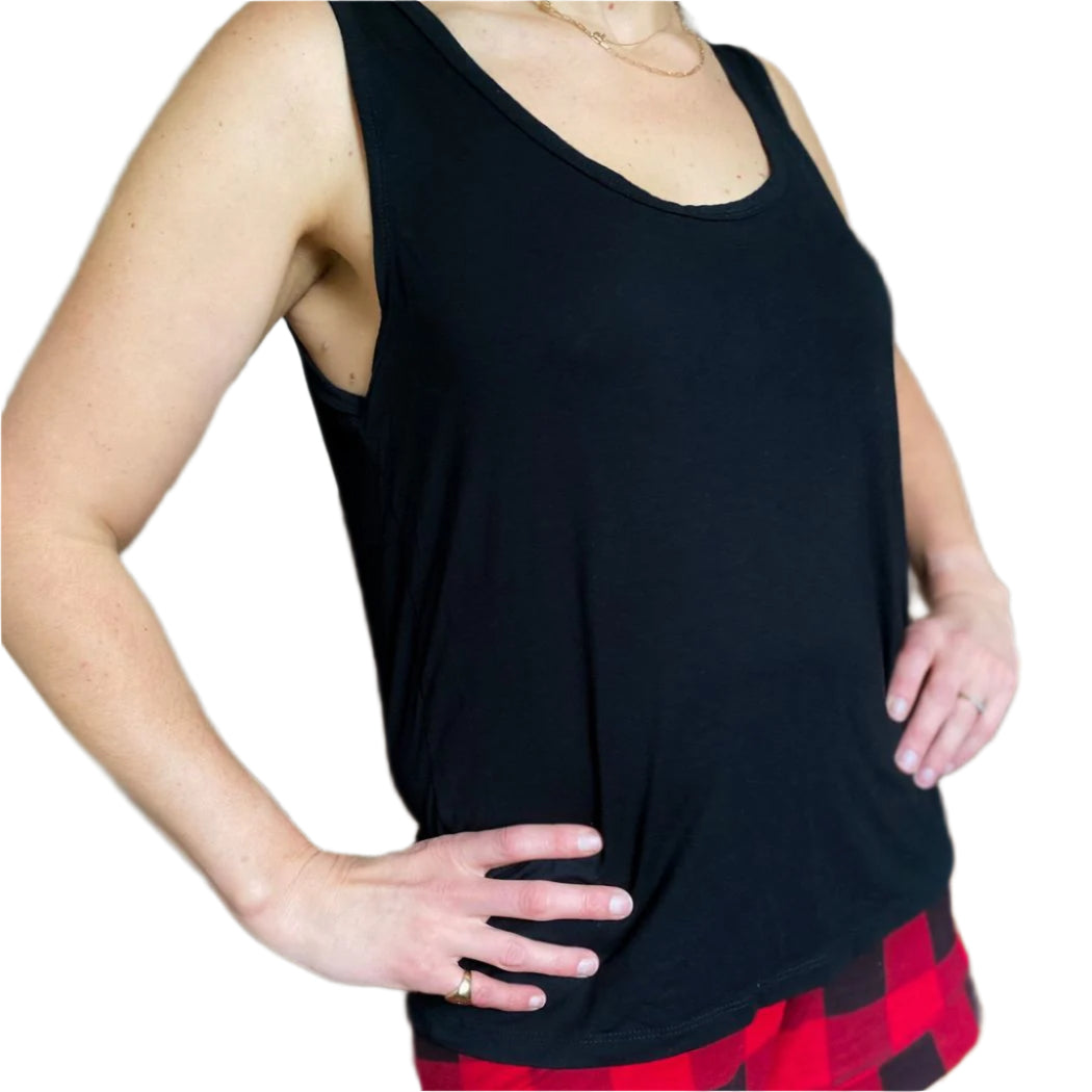 Woman wearing Women's Basics Tank Top in black, front view