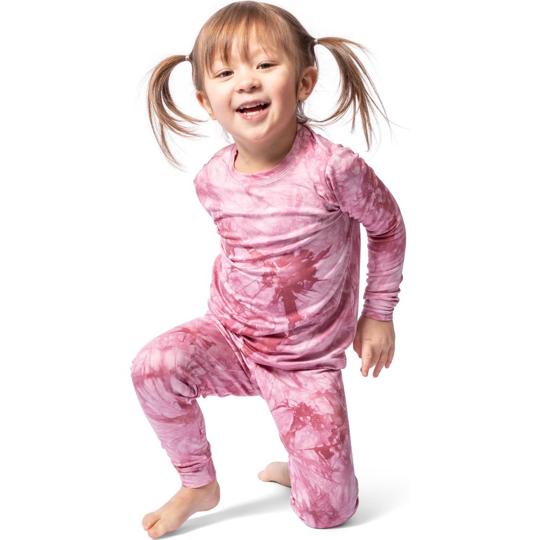 Toddler wearing Berry Tie Dye Kids Bamboo PJs in pink, front view
