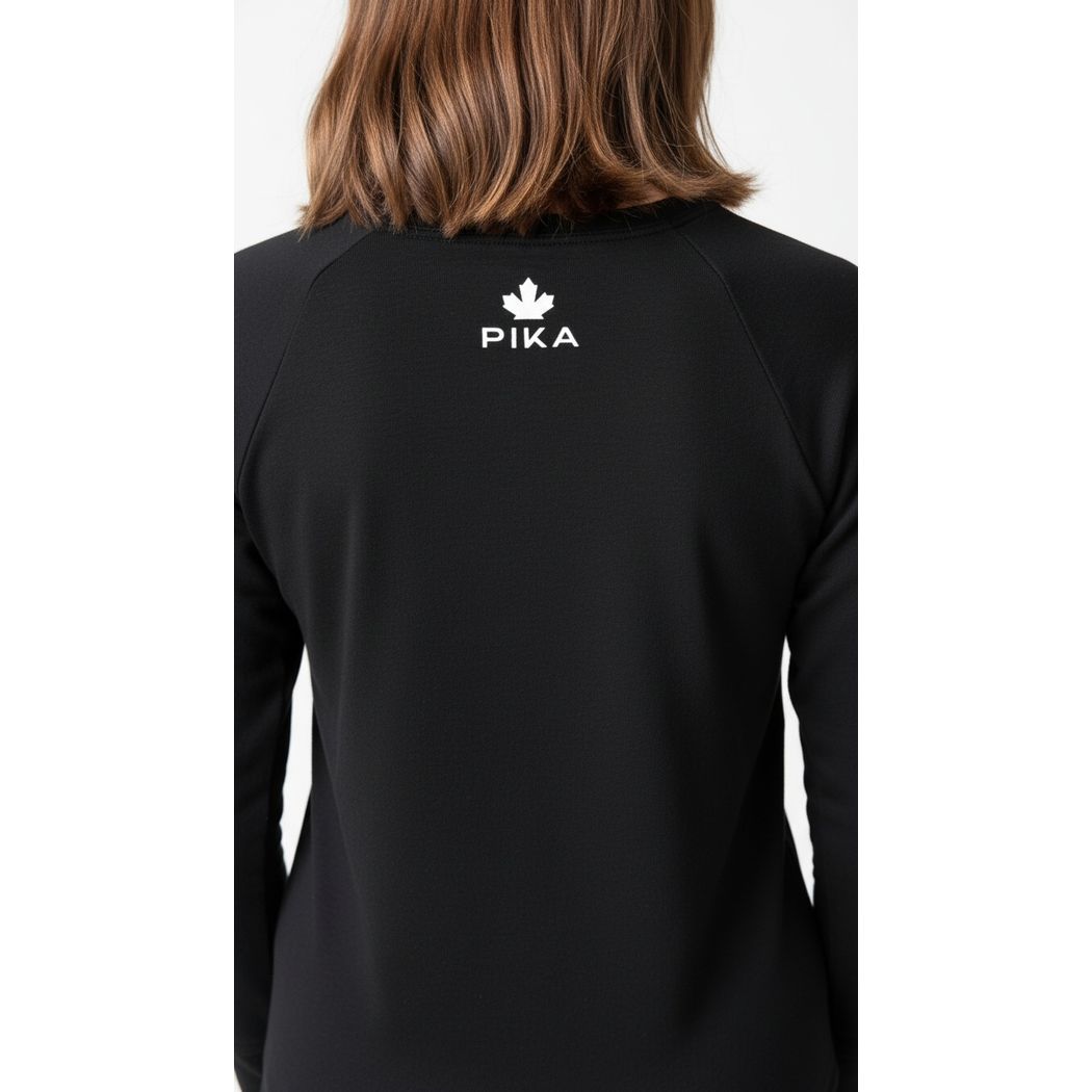 Child wearing Black Kids Merino Wool & Tencel Base Layer Set, back view