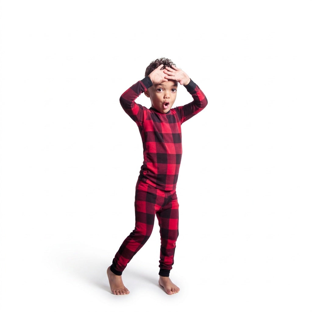 Boy wearing Canadian Plaid Kids Bamboo PJs in red, front view