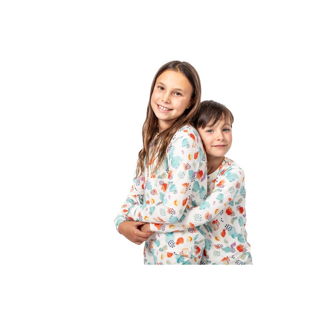 Kids wearing Confetti Cloud Kids Bamboo PJs in multicolor together