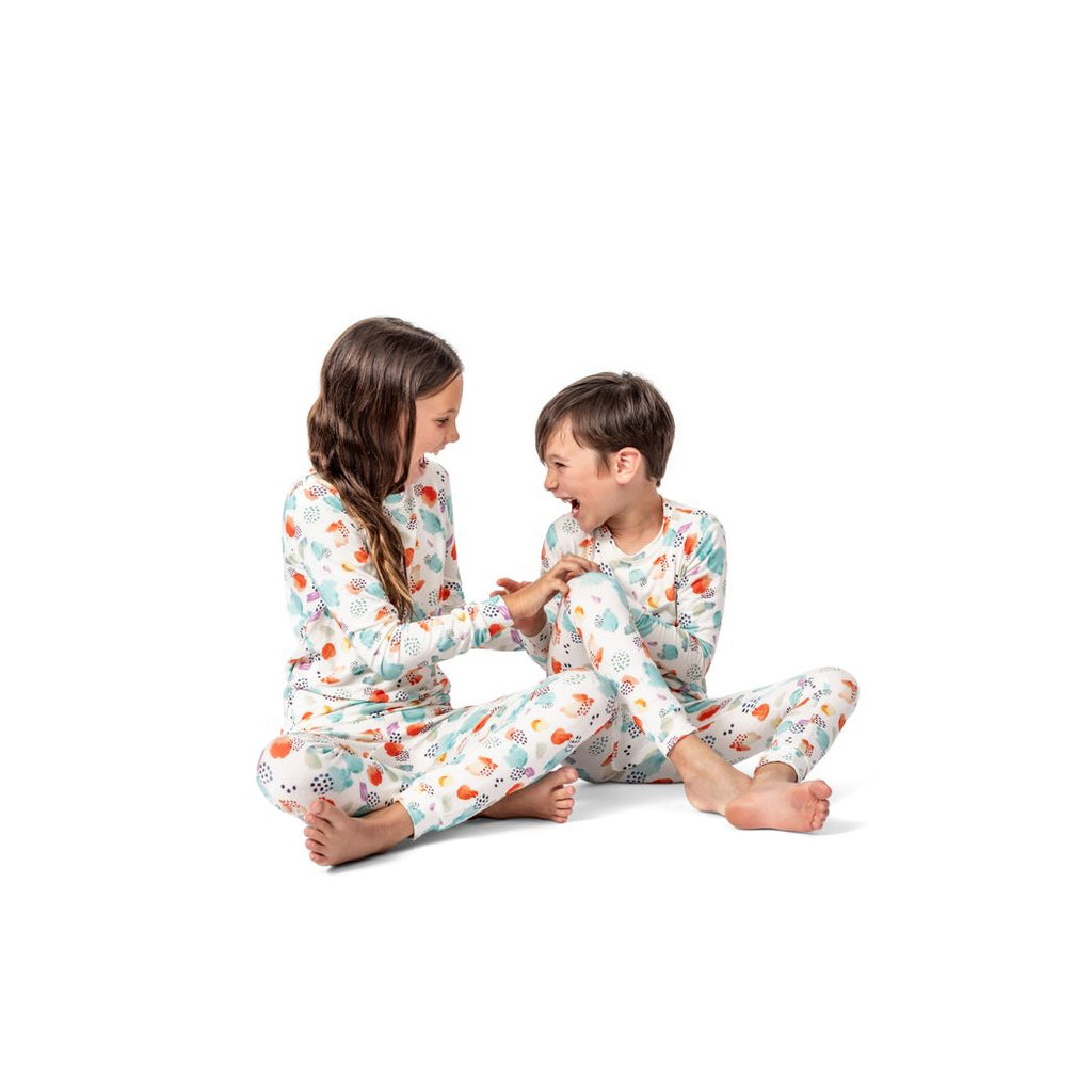 Kids wearing Confetti Cloud Kids Bamboo PJs in multicolor together