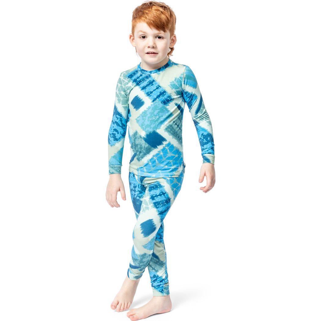Boy wearing Cosmic Kids Bamboo PJs in blue, front view