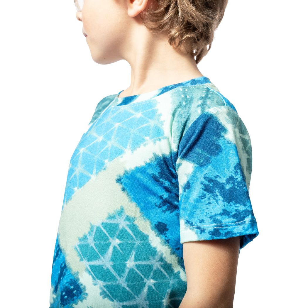 Close-up detail of boy wearing Cosmic Kids T-Shirt in blue