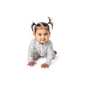 Baby wearing Dog Show Bamboo Zip Sleeper in neutral tones, front view
