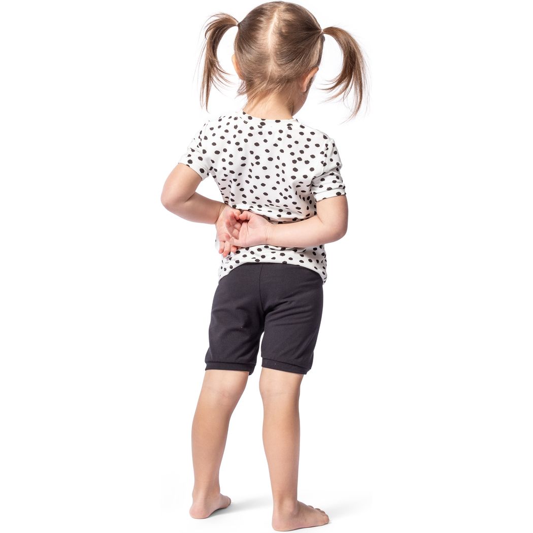 Toddler wearing Dot Bamboo Shorties PJ Set in black, back view