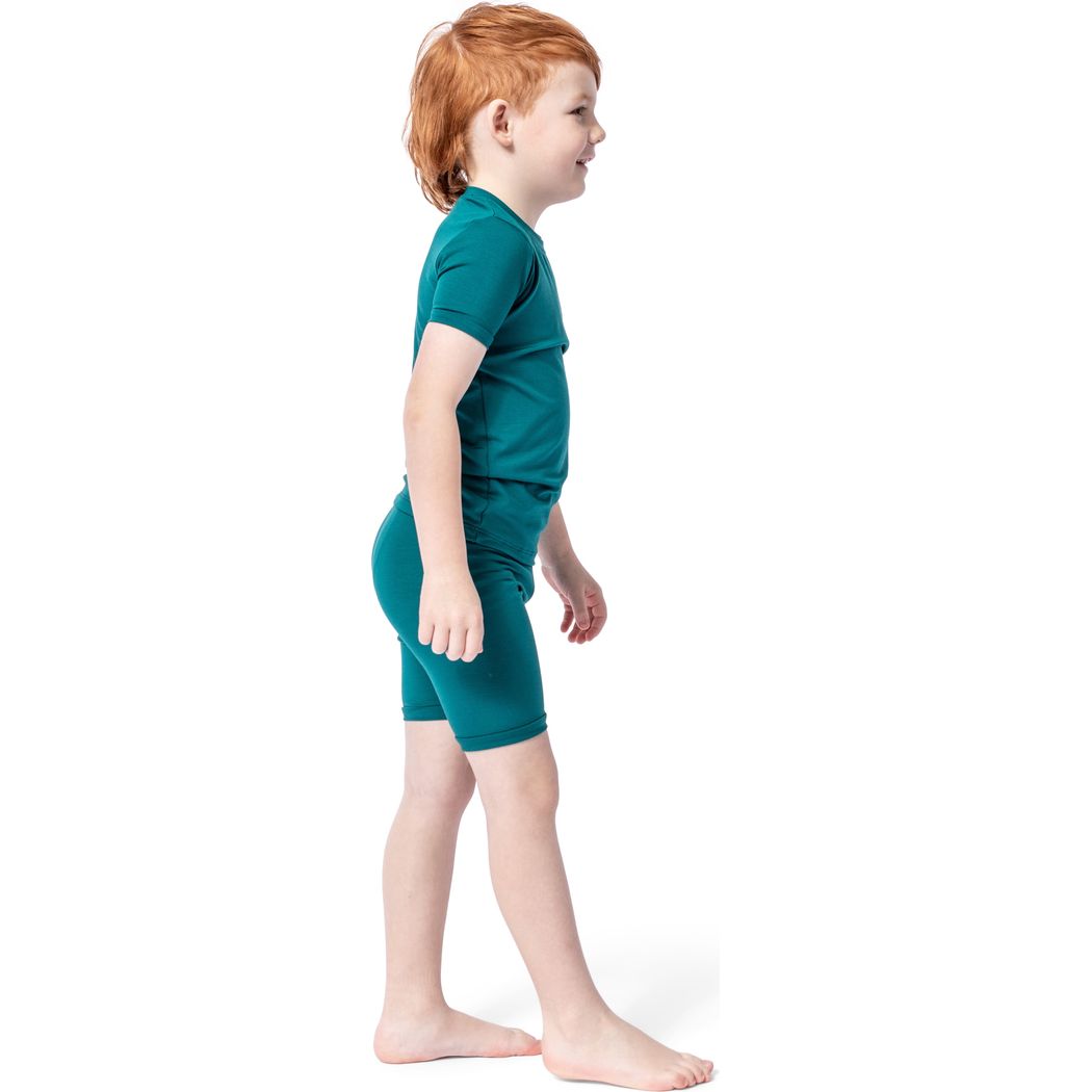 Boy wearing Emerald Bamboo Shorties PJ Set in green, side view