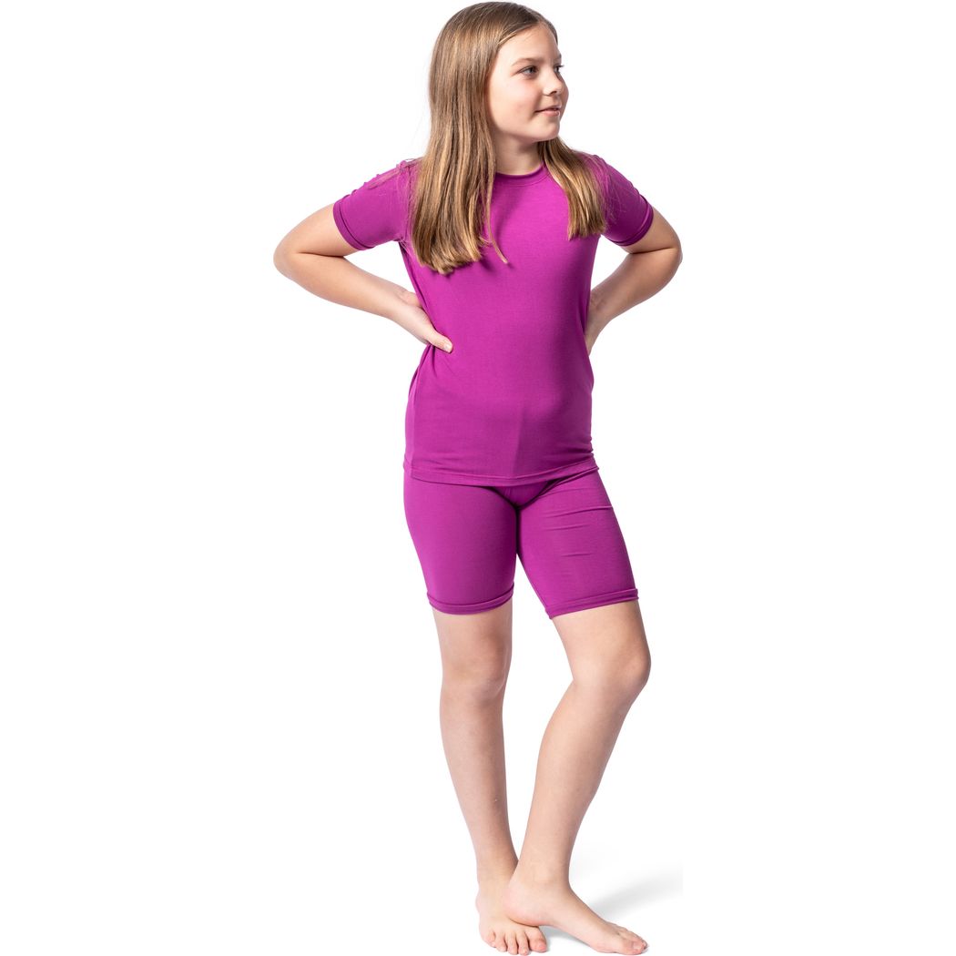 Girl wearing Fuchsia Bamboo Shorties PJ Set in pink, front view