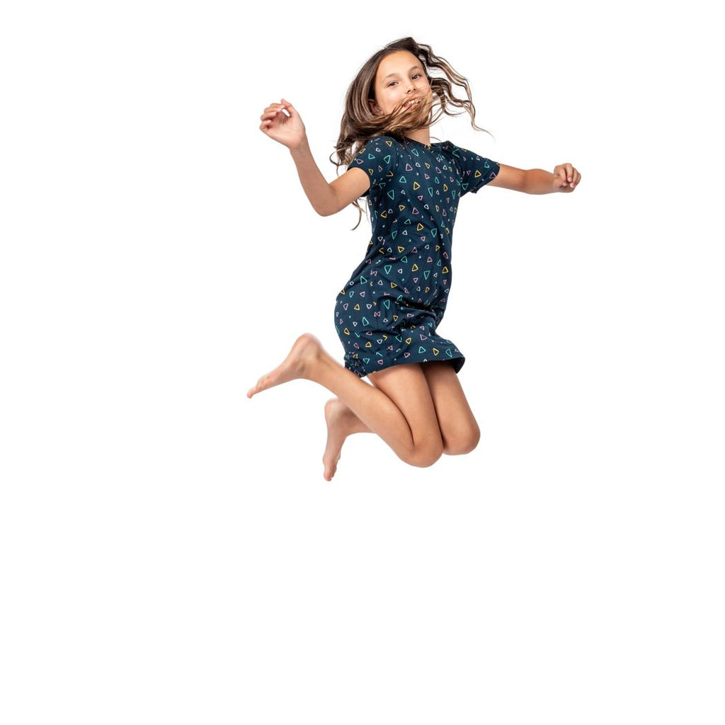 Girl wearing Geo Kids Snuggle Dress in navy, front view