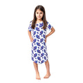 Girl with hands on hips wearing the Lily Kids Snuggle Dress