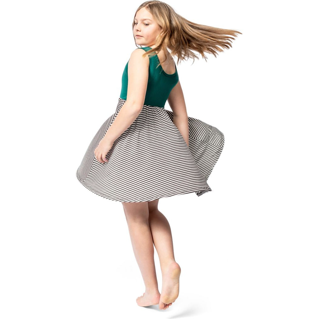 Girl wearing Lucky Stripe Tank Twirl Dress in green, side view