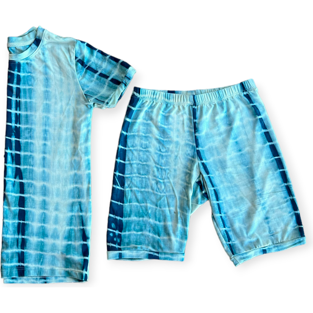 Mykonos Shibori Kids Bamboo Shorties PJ Set in blue laid flat on a white background