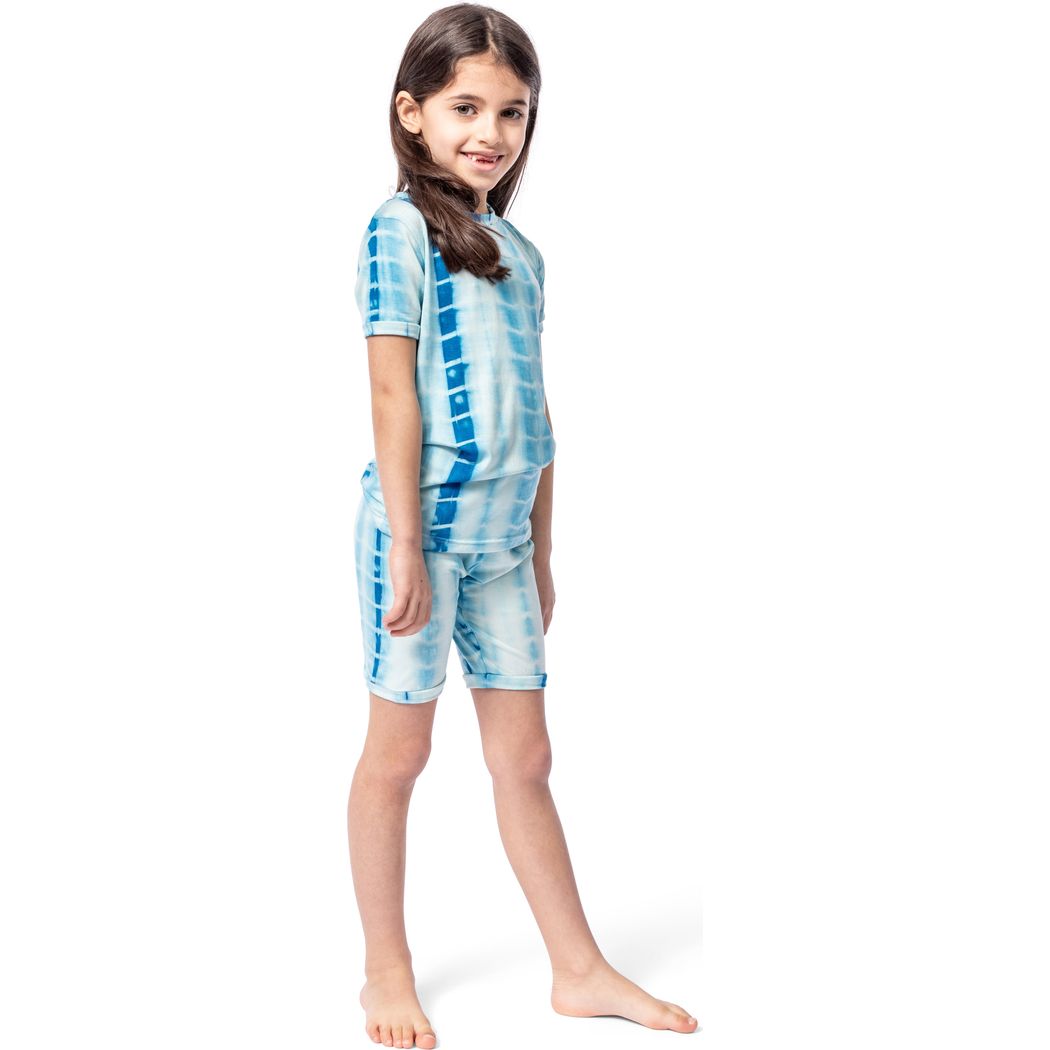 Girl wearing Mykonos Shibori Kids Bamboo Shorties PJ Set in blue, front view