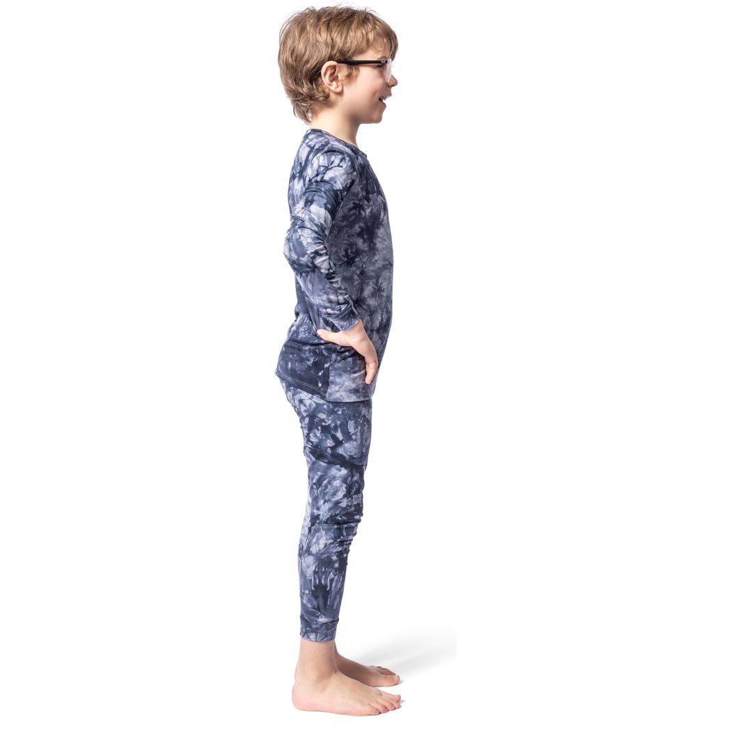 Boy wearing Navy Tie Dye Kids Bamboo PJs, side view