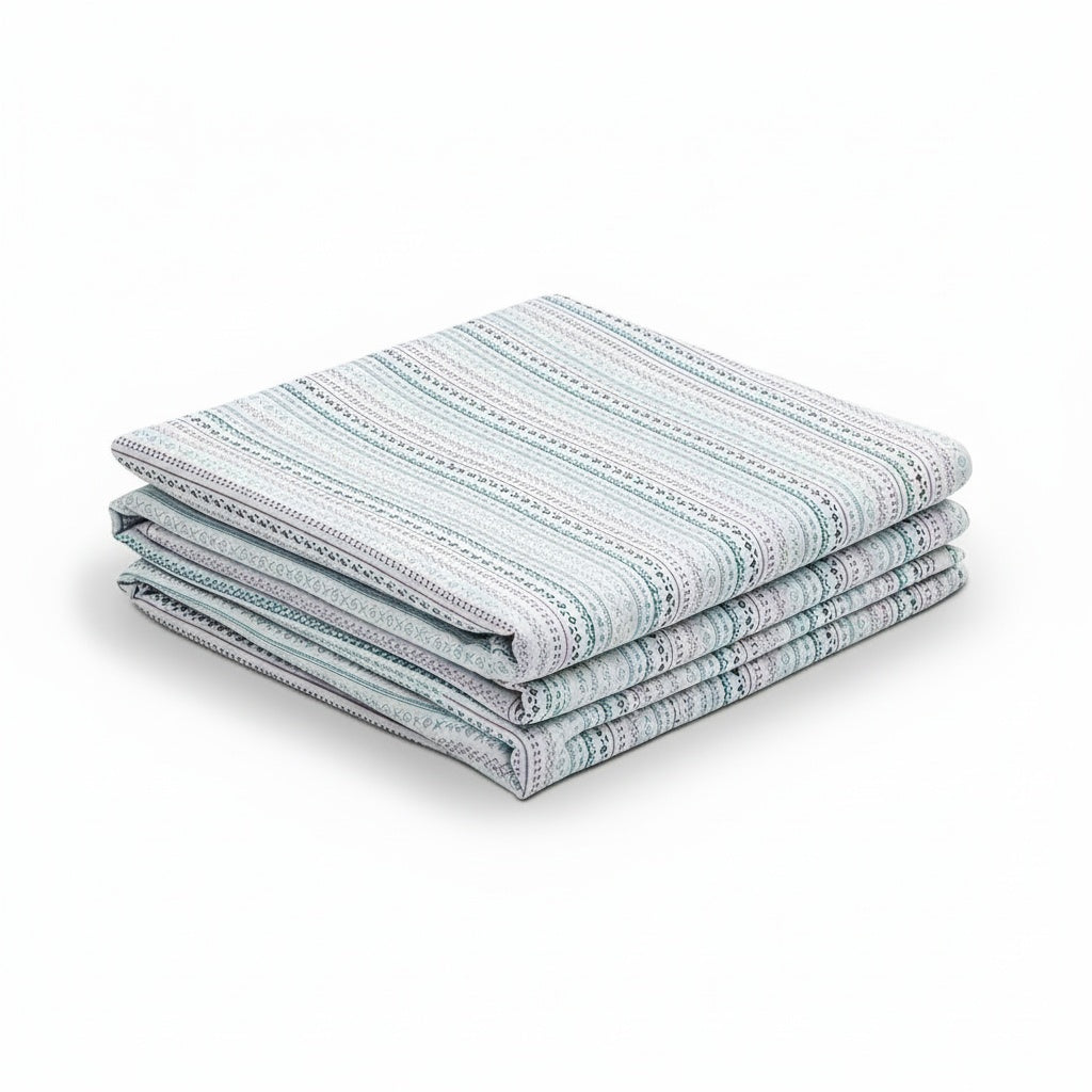 Nordic Baby Bamboo Crib Sheet in neutral tones, styled product image
