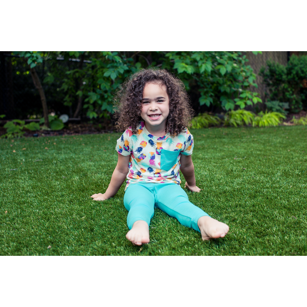 Girl wearing Pineapple Kids T-Shirt in multicolor, lifestyle photo