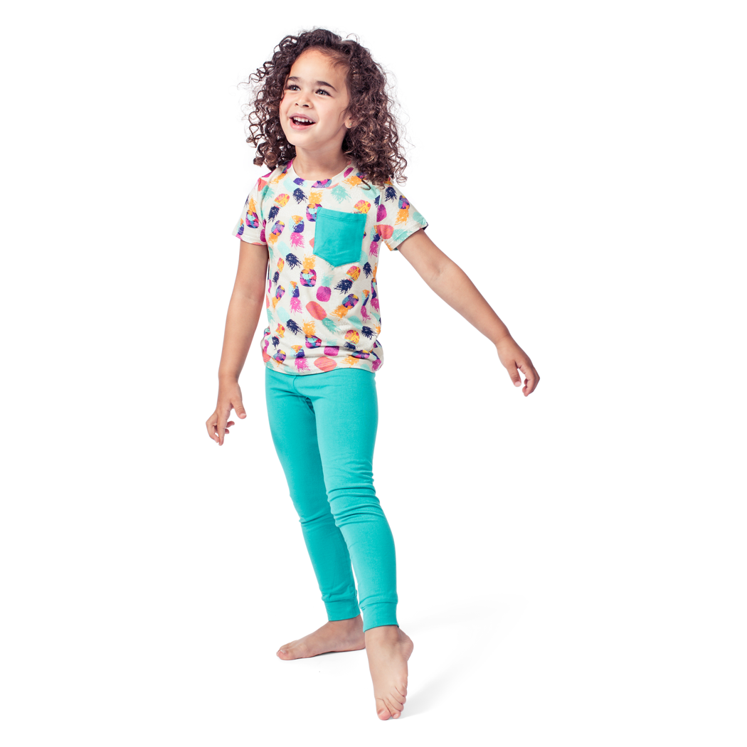 Girl wearing Pineapple Kids T-Shirt in multicolor, front view