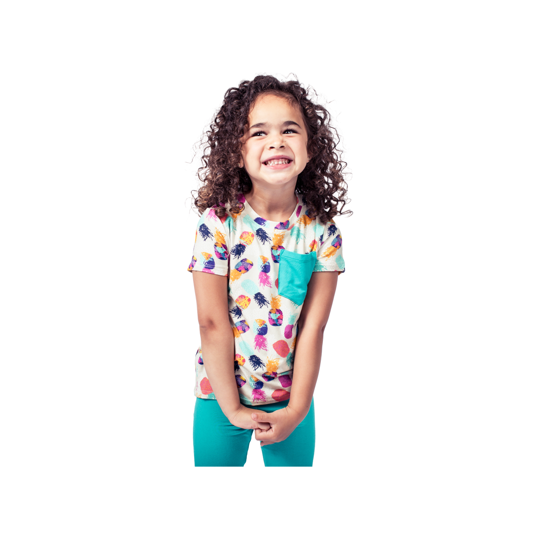 Girl wearing Pineapple Kids T-Shirt in multicolor, front view