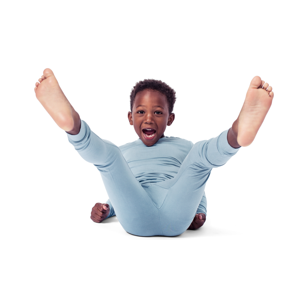 Boy wearing Rain Kids Bamboo PJs in blue, front view
