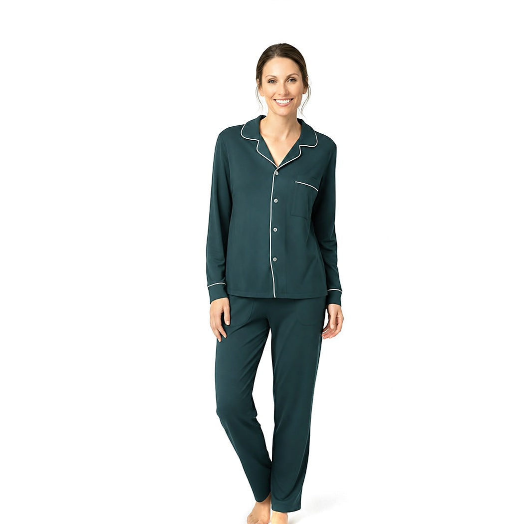Woman wearing the Sea Moss Women's Button Down Lounge Set in dark green with white piping, front view