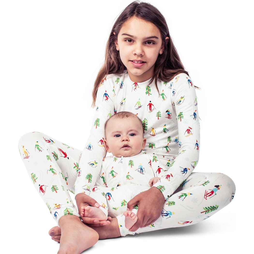 Kids wearing Skiers Bamboo Zip Sleeper in neutral tones together