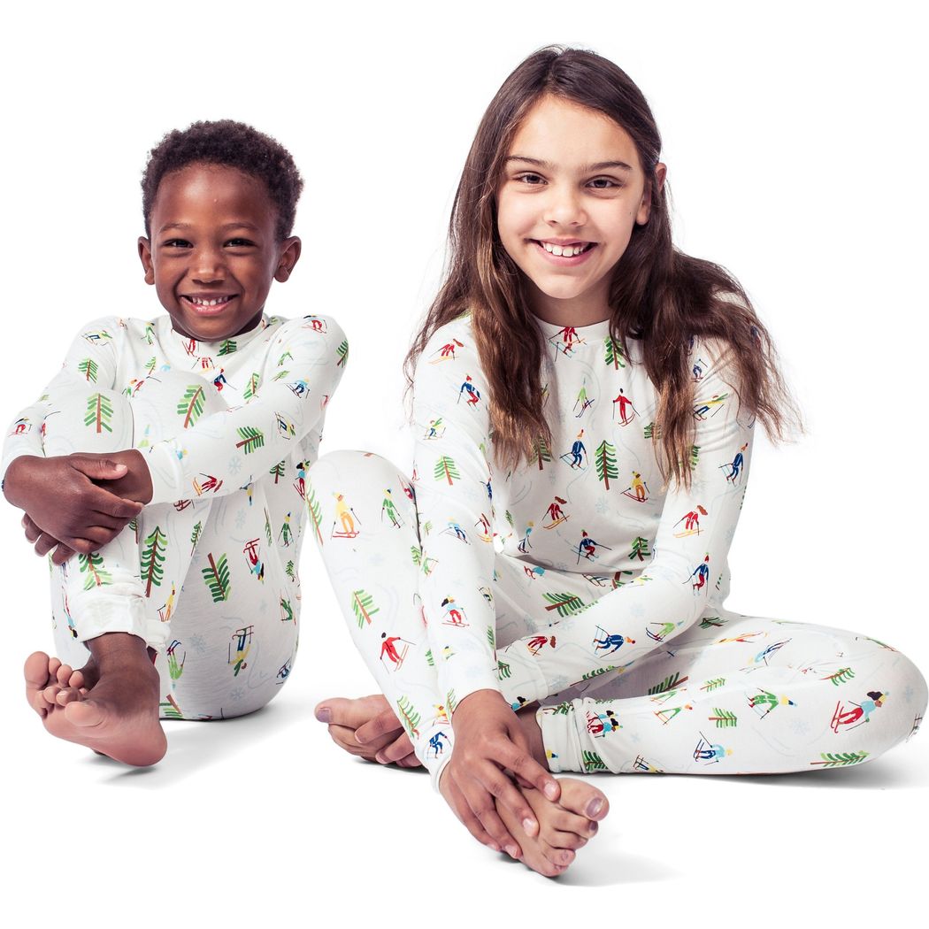 Kids wearing Skiers Kids Bamboo PJs in neutral tones together