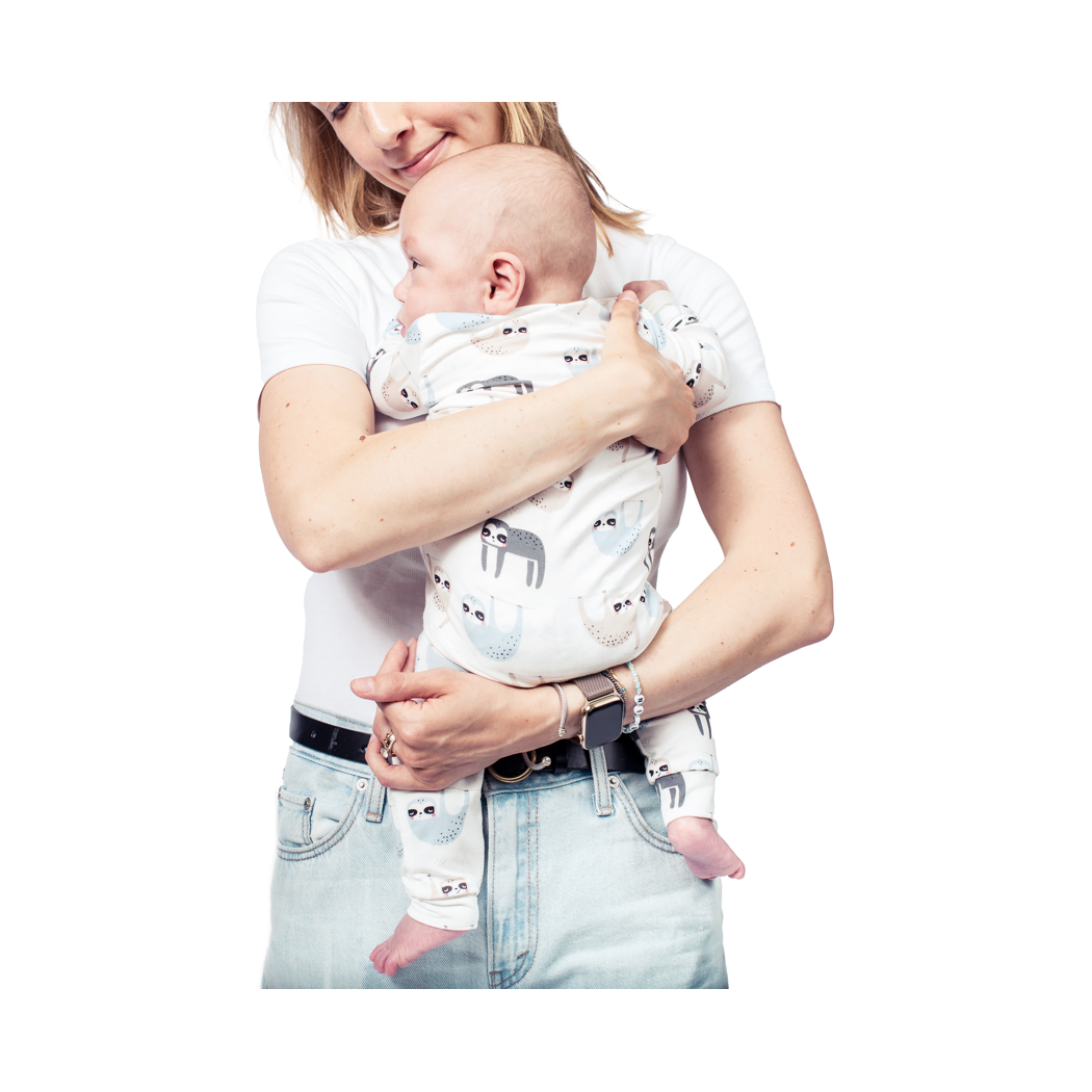Family wearing matching Sloth loungewear, including the Sloth Bamboo Zip Sleeper
