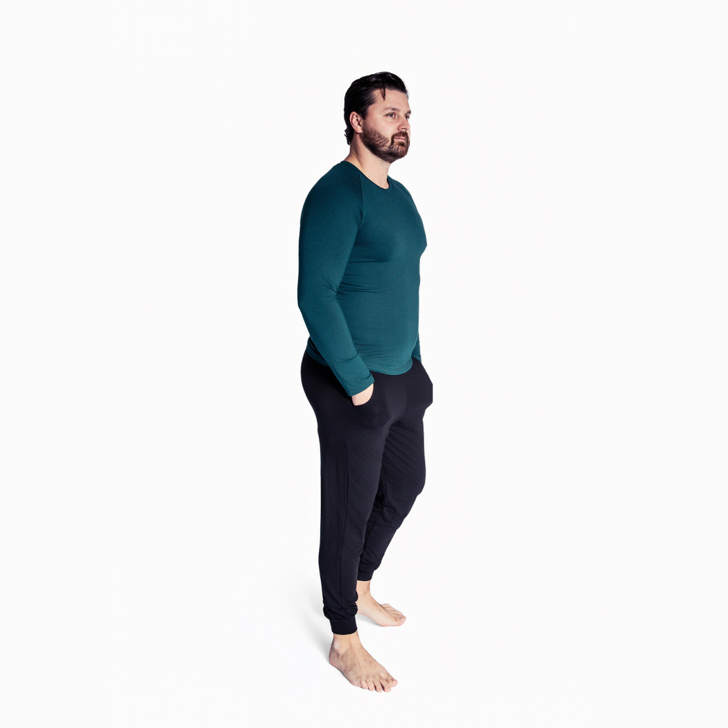 Man wearing Spruce Men's Lounge Set in green, side view