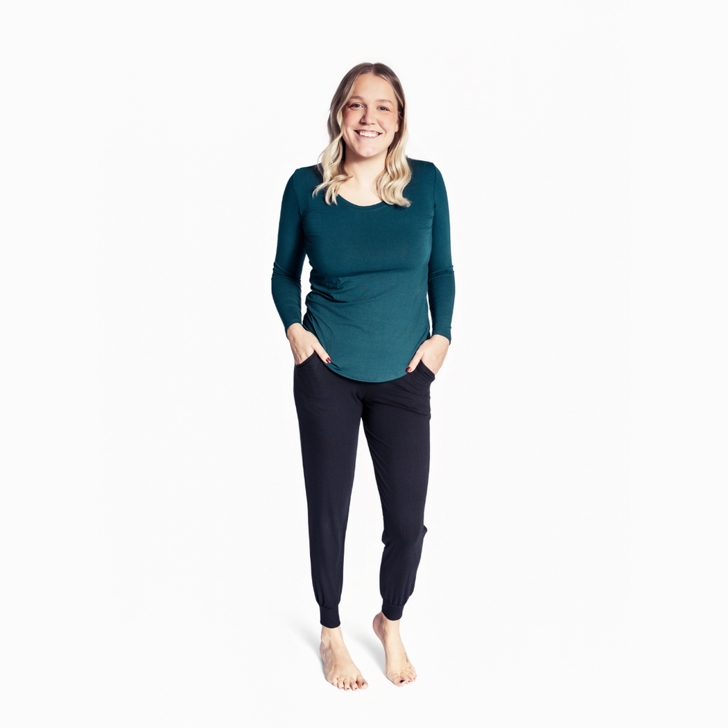 Woman wearing Spruce Womens Long Sleeve Pant Set in green, front view