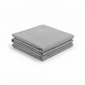 Stripe Baby Bamboo Crib Sheet in black, styled product image