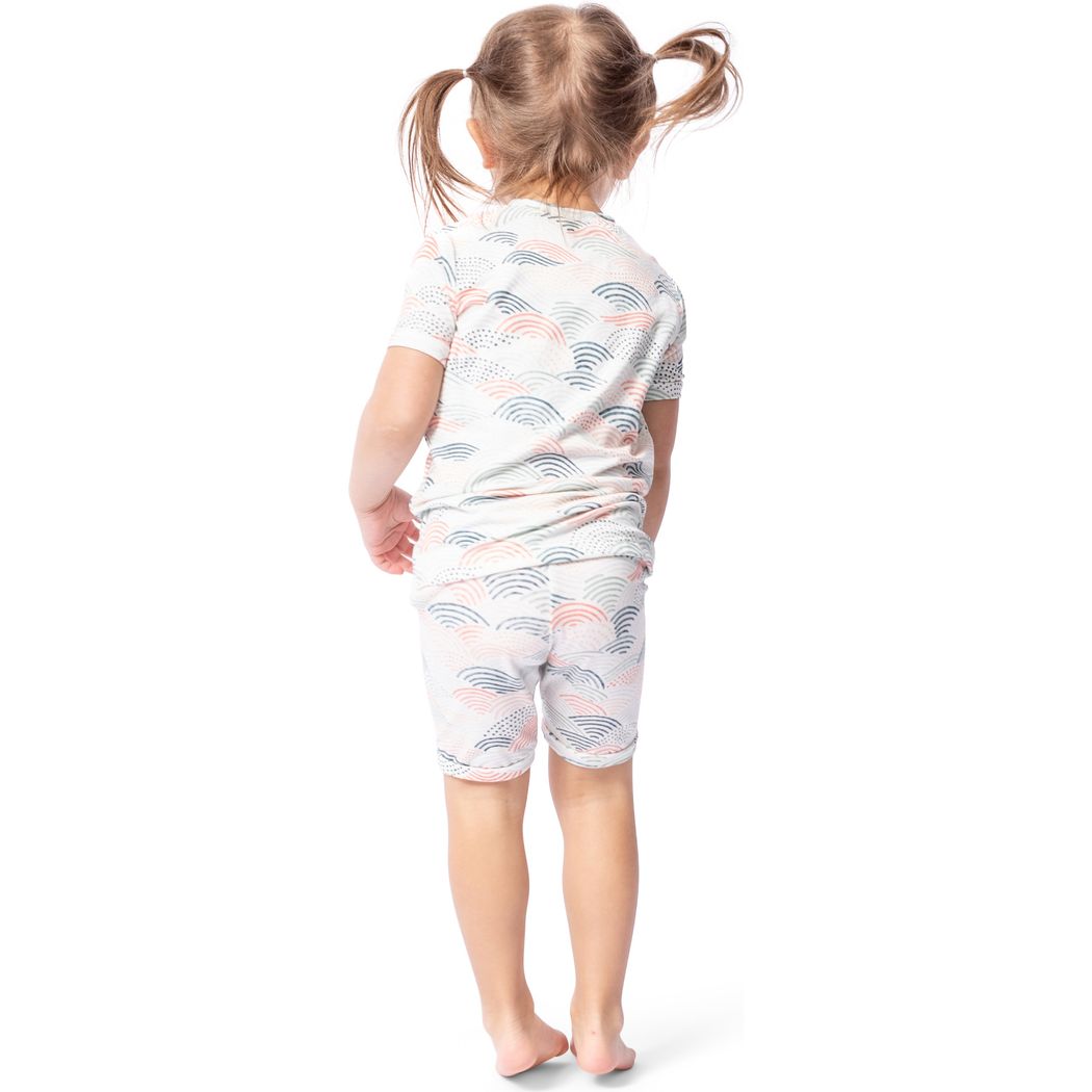 Toddler wearing Summer Breeze Bamboo Shorties PJ Set in neutral tones, back view