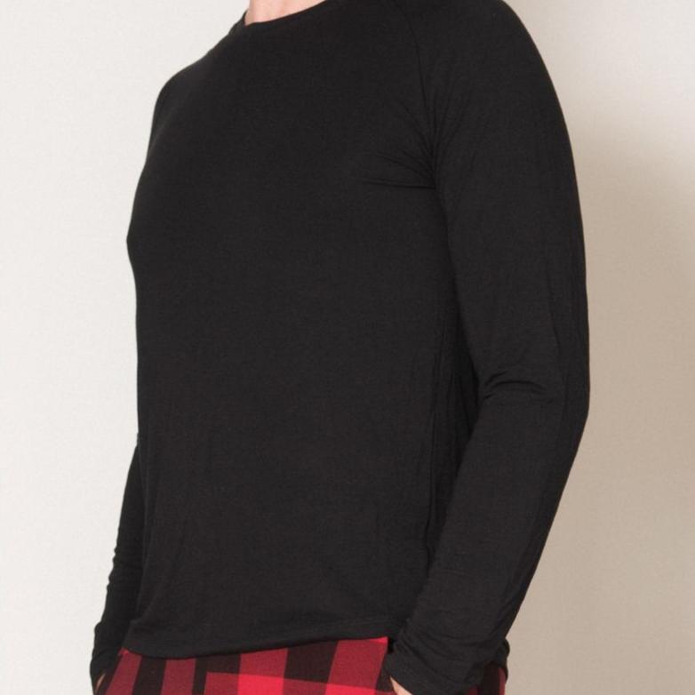 Man wearing Black Men's Long Sleeve Shirt, front view