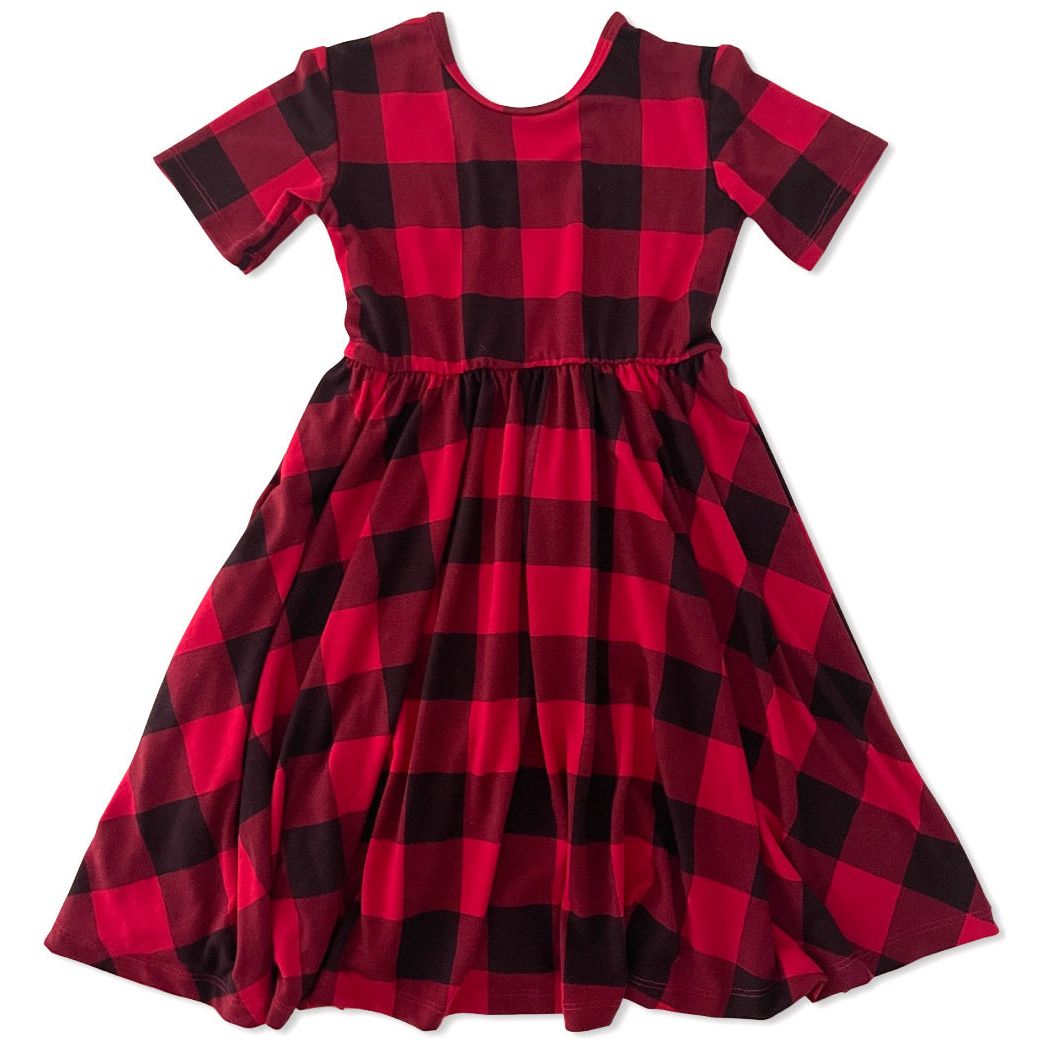 Canadian Plaid Kids Twirl Dress in red laid flat on a white background